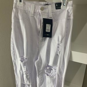 White ripped Fashion Nova jeans.